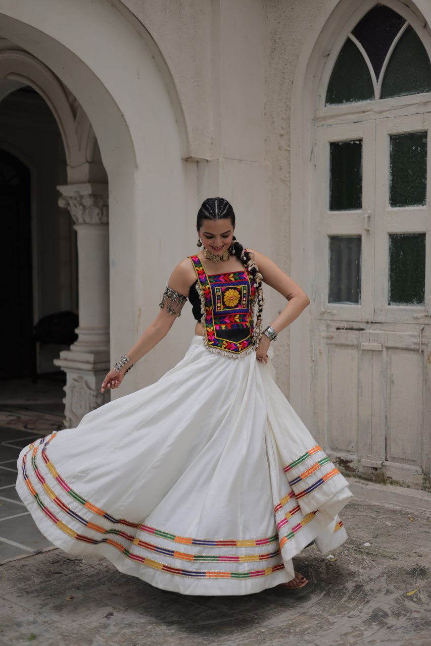 White Festive Roman Fabric Lehenga with black Kutchi Gamthi Embroidered Top ClothsVilla