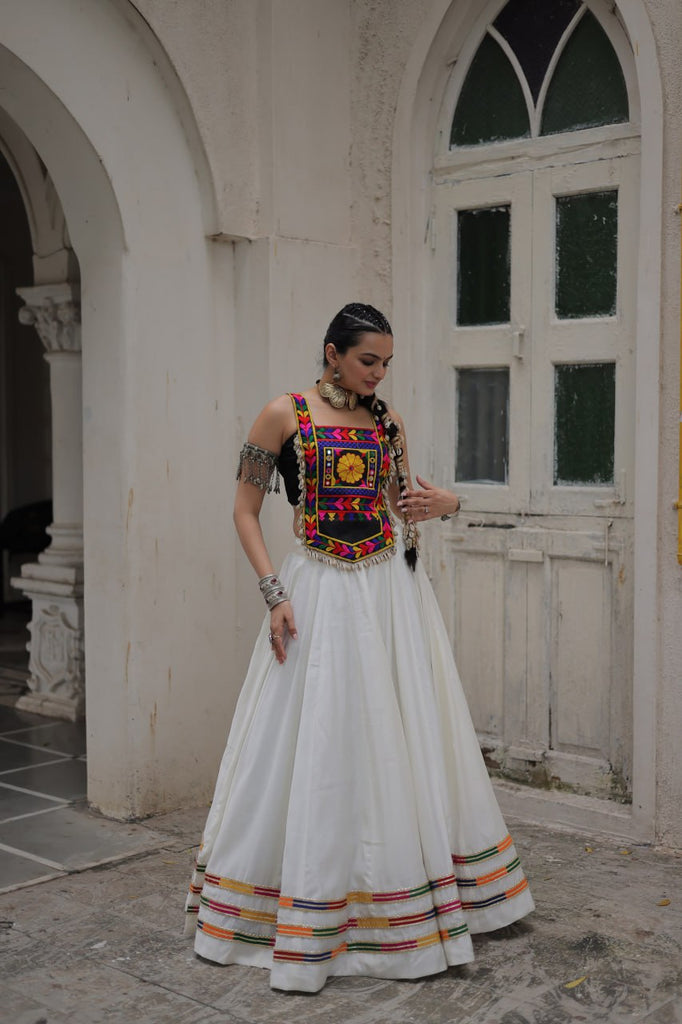 White Festive Roman Fabric Lehenga with black Kutchi Gamthi Embroidered Top ClothsVilla