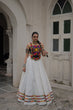 Load image into Gallery viewer, White Festive Roman Fabric Lehenga with black Kutchi Gamthi Embroidered Top ClothsVilla