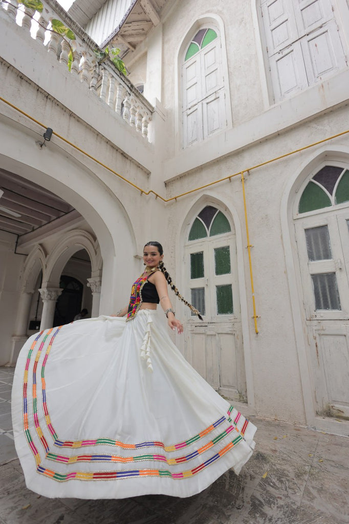 White Festive Roman Fabric Lehenga with black Kutchi Gamthi Embroidered Top ClothsVilla