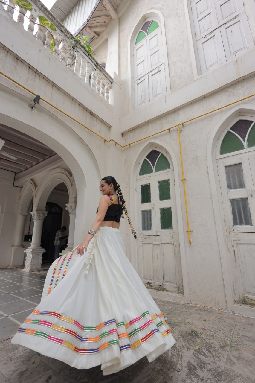 White Festive Roman Fabric Lehenga with black Kutchi Gamthi Embroidered Top ClothsVilla