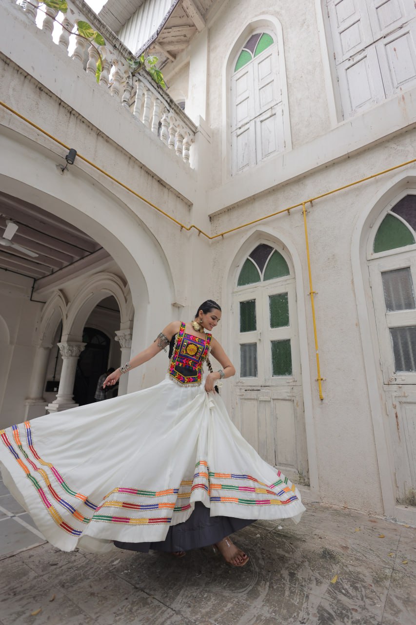 White Festive Roman Fabric Lehenga with black Kutchi Gamthi Embroidered Top ClothsVilla
