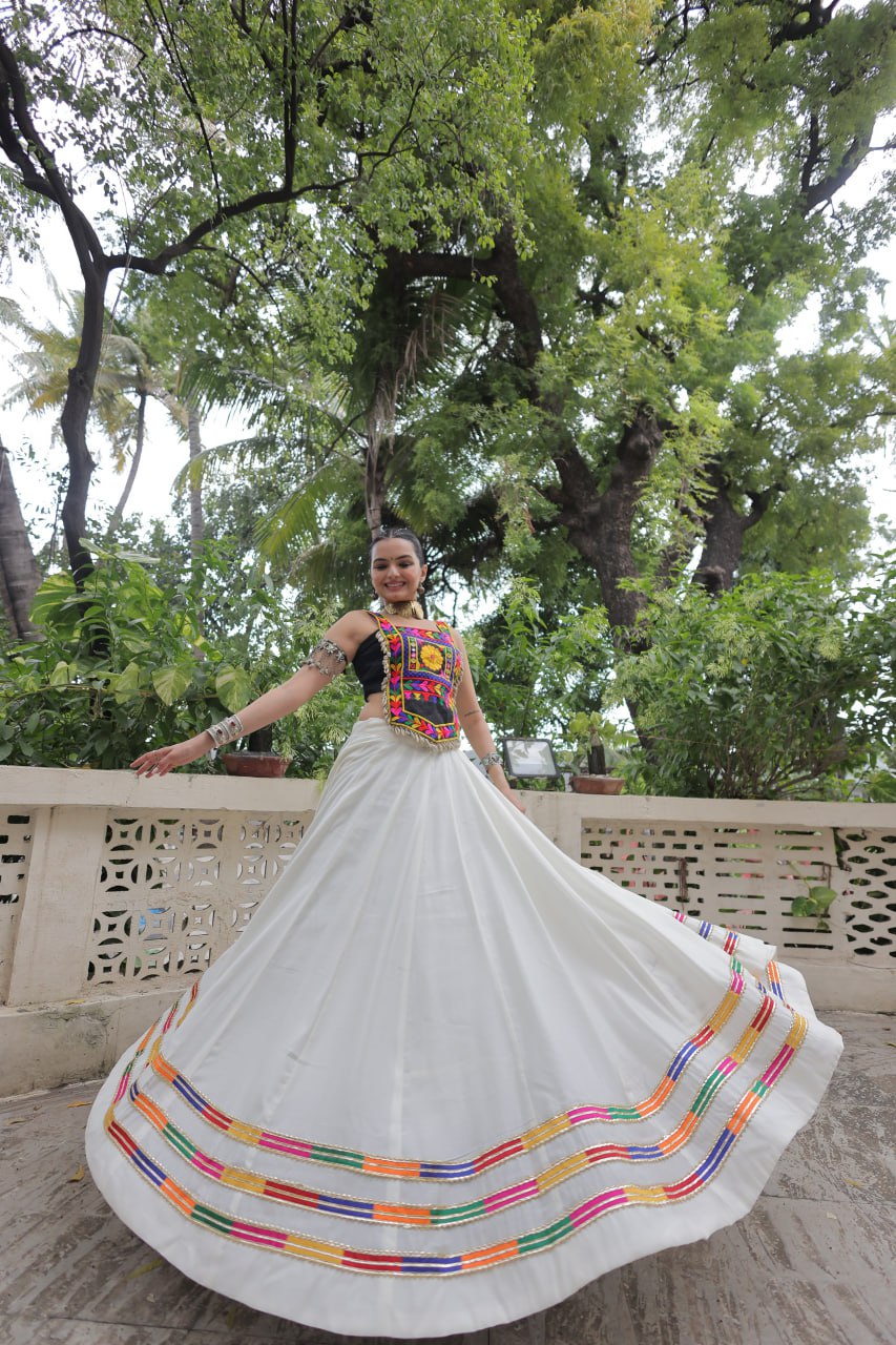 White Festive Roman Fabric Lehenga with black Kutchi Gamthi Embroidered Top ClothsVilla