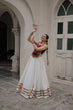 Load image into Gallery viewer, White Festive Roman Fabric Lehenga with black Kutchi Gamthi Embroidered Top ClothsVilla