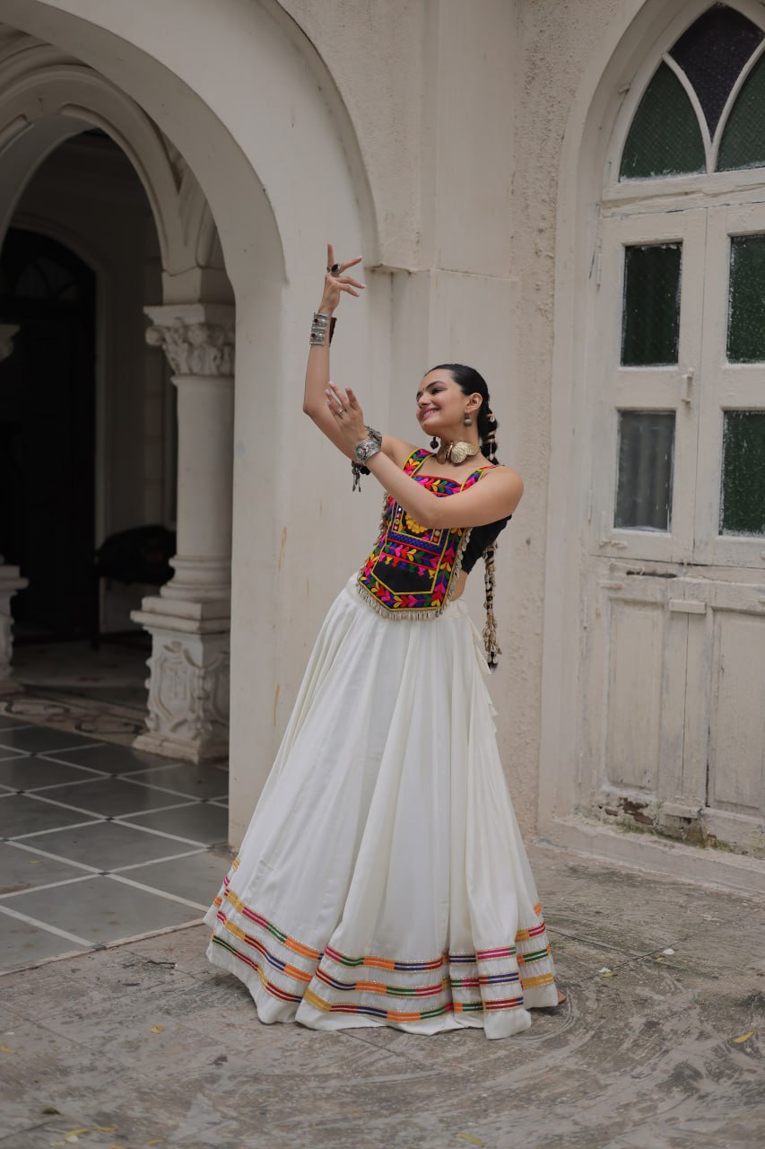 White Festive Roman Fabric Lehenga with black Kutchi Gamthi Embroidered Top ClothsVilla