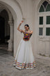 Load image into Gallery viewer, White Festive Roman Fabric Lehenga with black Kutchi Gamthi Embroidered Top ClothsVilla