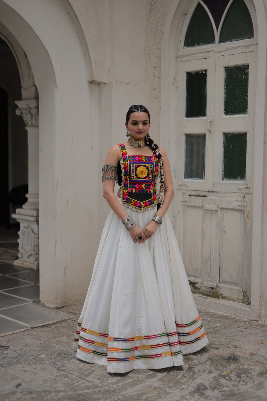 White Festive Roman Fabric Lehenga with black Kutchi Gamthi Embroidered Top ClothsVilla