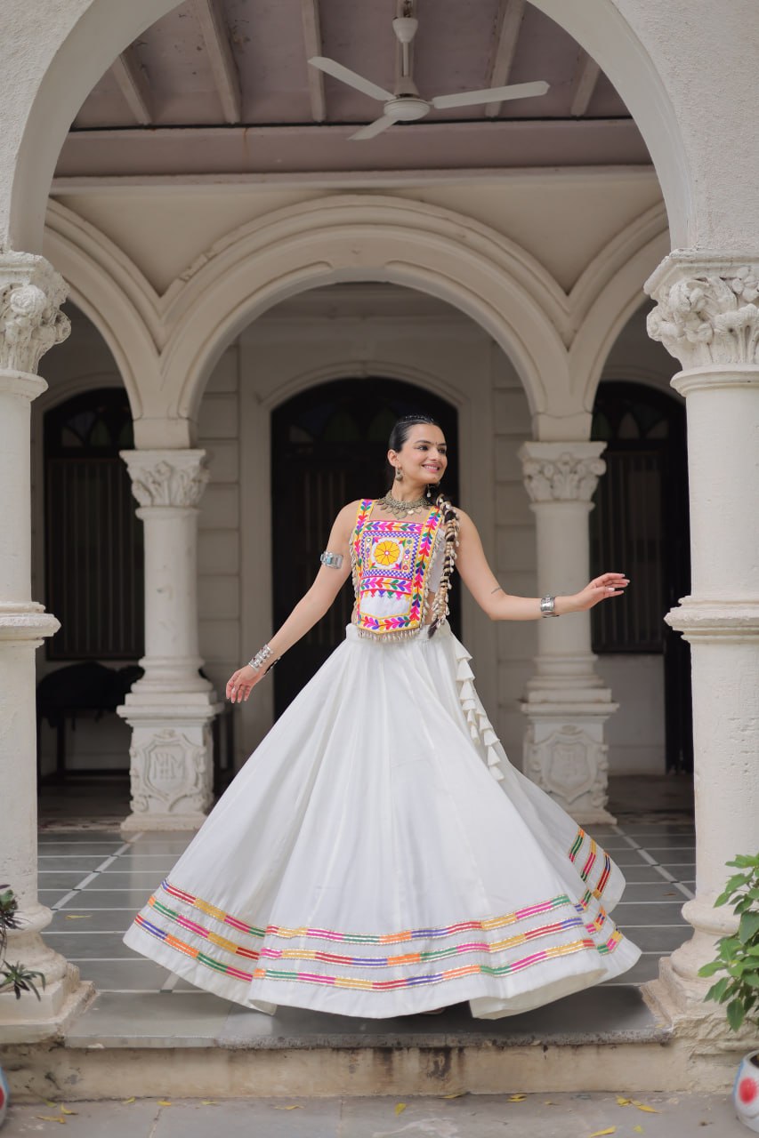 White Festive Roman Fabric Lehenga with Kutchi Gamthi Embroidered Top ClothsVilla