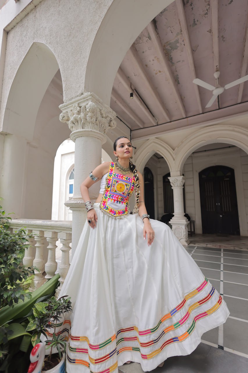 White Festive Roman Fabric Lehenga with Kutchi Gamthi Embroidered Top ClothsVilla