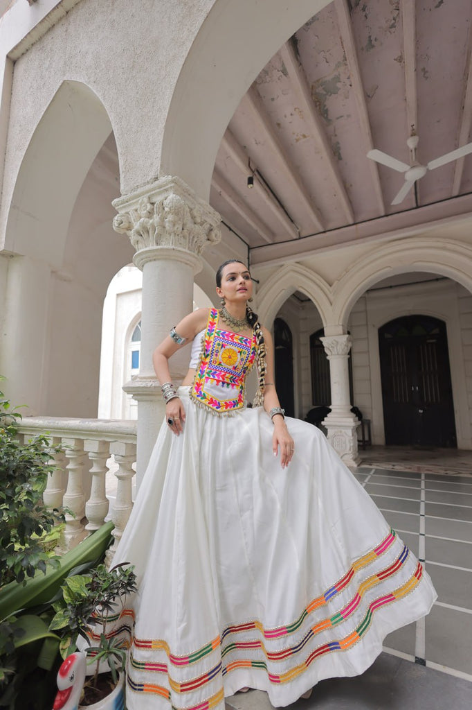 White Festive Roman Fabric Lehenga with Kutchi Gamthi Embroidered Top ClothsVilla