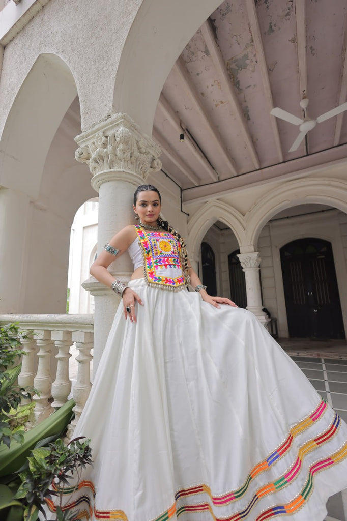 White Festive Roman Fabric Lehenga with Kutchi Gamthi Embroidered Top ClothsVilla