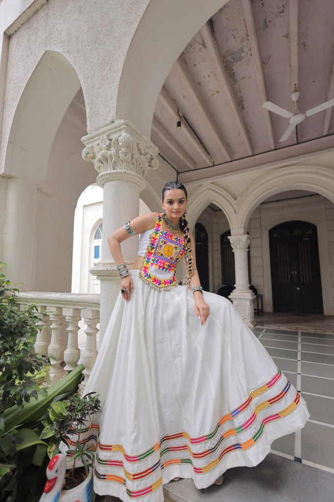 White Festive Roman Fabric Lehenga with Kutchi Gamthi Embroidered Top ClothsVilla