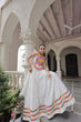 Load image into Gallery viewer, White Festive Roman Fabric Lehenga with Kutchi Gamthi Embroidered Top ClothsVilla