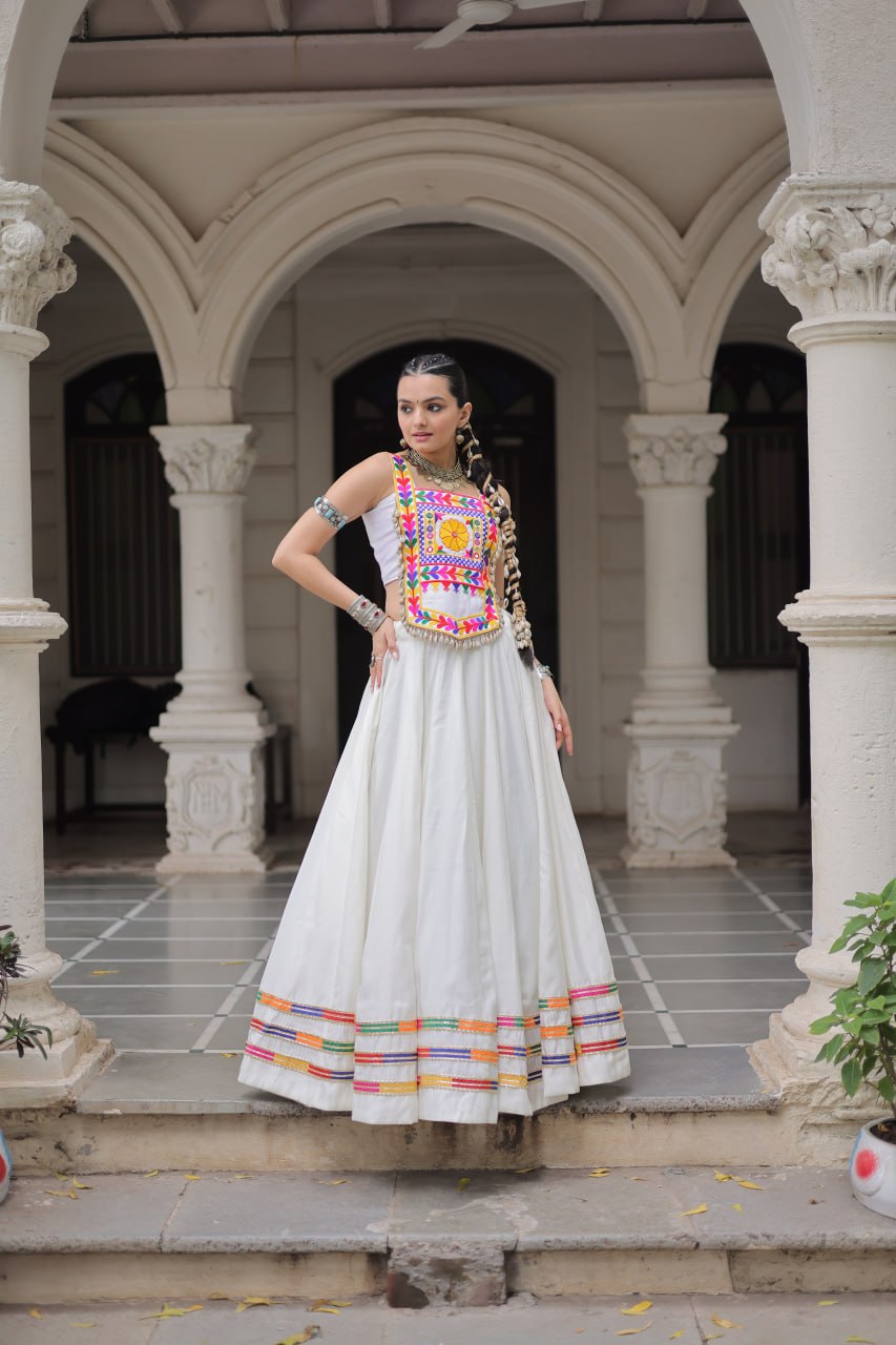 White Festive Roman Fabric Lehenga with Kutchi Gamthi Embroidered Top ClothsVilla