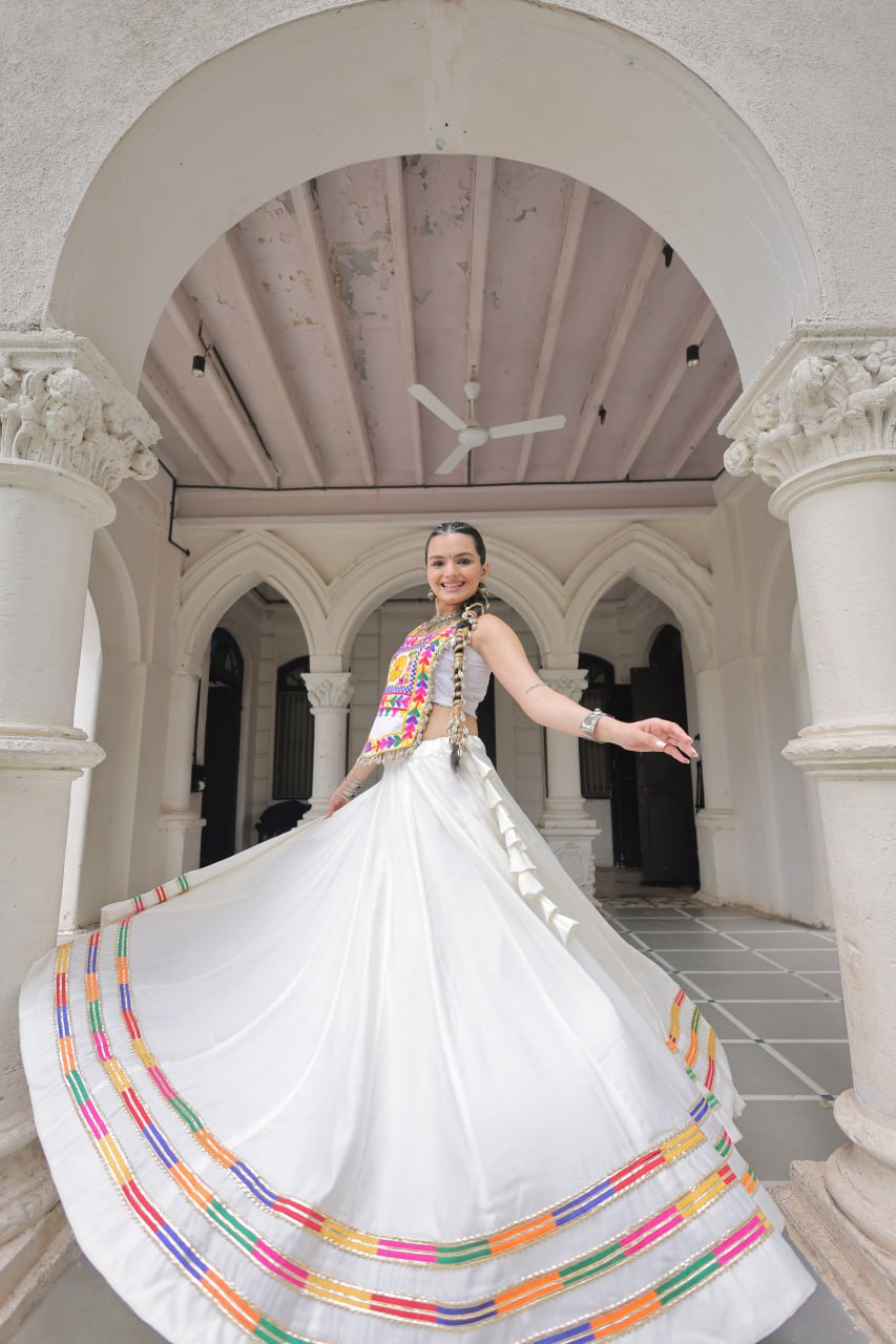 White Festive Roman Fabric Lehenga with Kutchi Gamthi Embroidered Top ClothsVilla