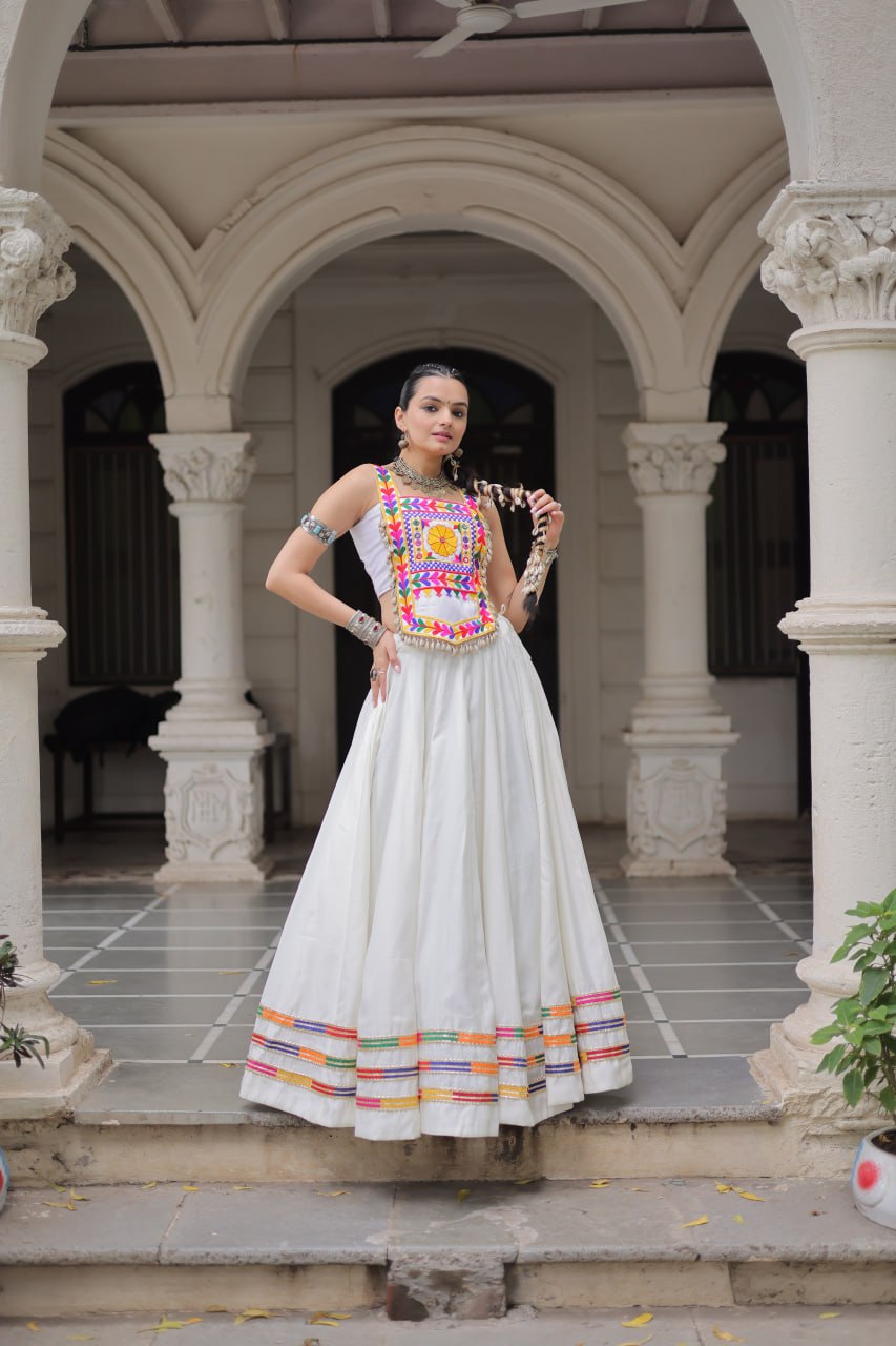 White Festive Roman Fabric Lehenga with Kutchi Gamthi Embroidered Top ClothsVilla
