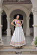 Load image into Gallery viewer, White Festive Roman Fabric Lehenga with Kutchi Gamthi Embroidered Top ClothsVilla