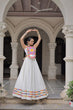 Load image into Gallery viewer, White Festive Roman Fabric Lehenga with Kutchi Gamthi Embroidered Top ClothsVilla