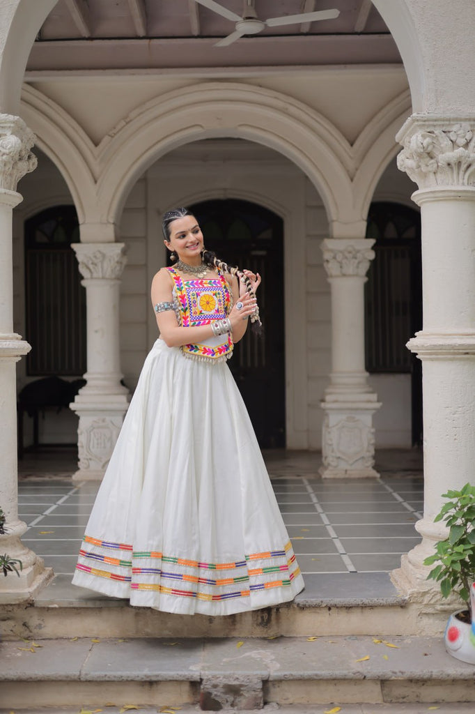 White Festive Roman Fabric Lehenga with Kutchi Gamthi Embroidered Top ClothsVilla