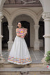 Load image into Gallery viewer, White Festive Roman Fabric Lehenga with Kutchi Gamthi Embroidered Top ClothsVilla