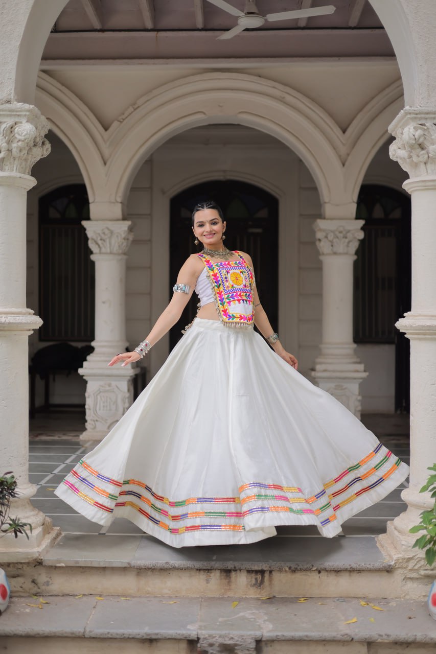 White Festive Roman Fabric Lehenga with Kutchi Gamthi Embroidered Top ClothsVilla