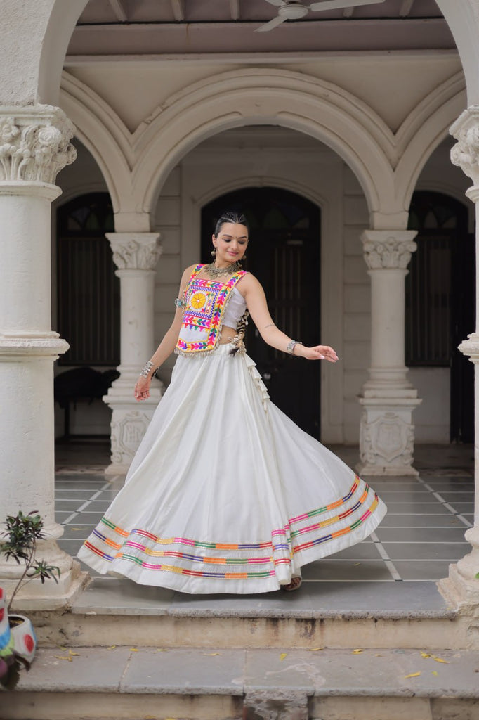White Festive Roman Fabric Lehenga with Kutchi Gamthi Embroidered Top ClothsVilla
