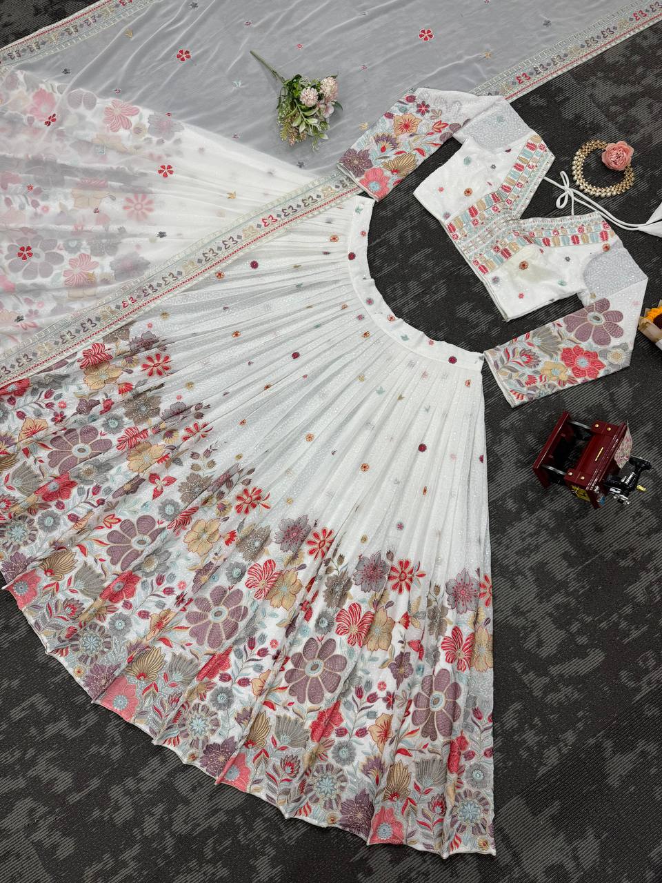 White Graceful Faux Georgette Lehenga Choli Set with Sequin & Thread Embroidery ClothsVilla