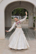 Load image into Gallery viewer, White Navratri Special Roman Fabric Lehenga Choli with Kutchi Gamthi &amp; Mirror Work ClothsVilla