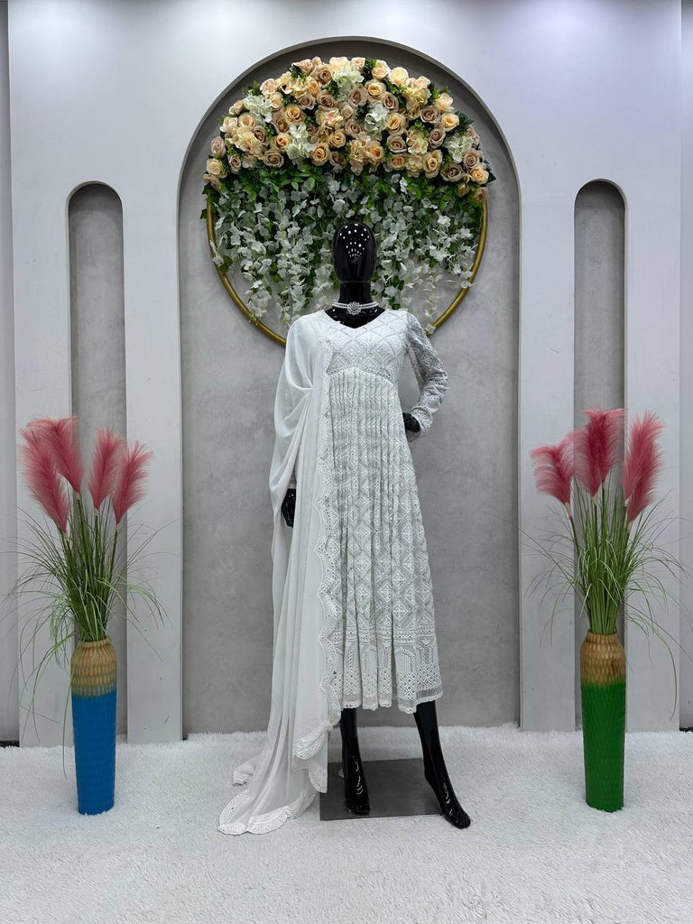 White Elegant Lakhnavi Embroidered Georgette Suit With Des White Elegant Lakhnavi Embroidered Georgette Suit With Des