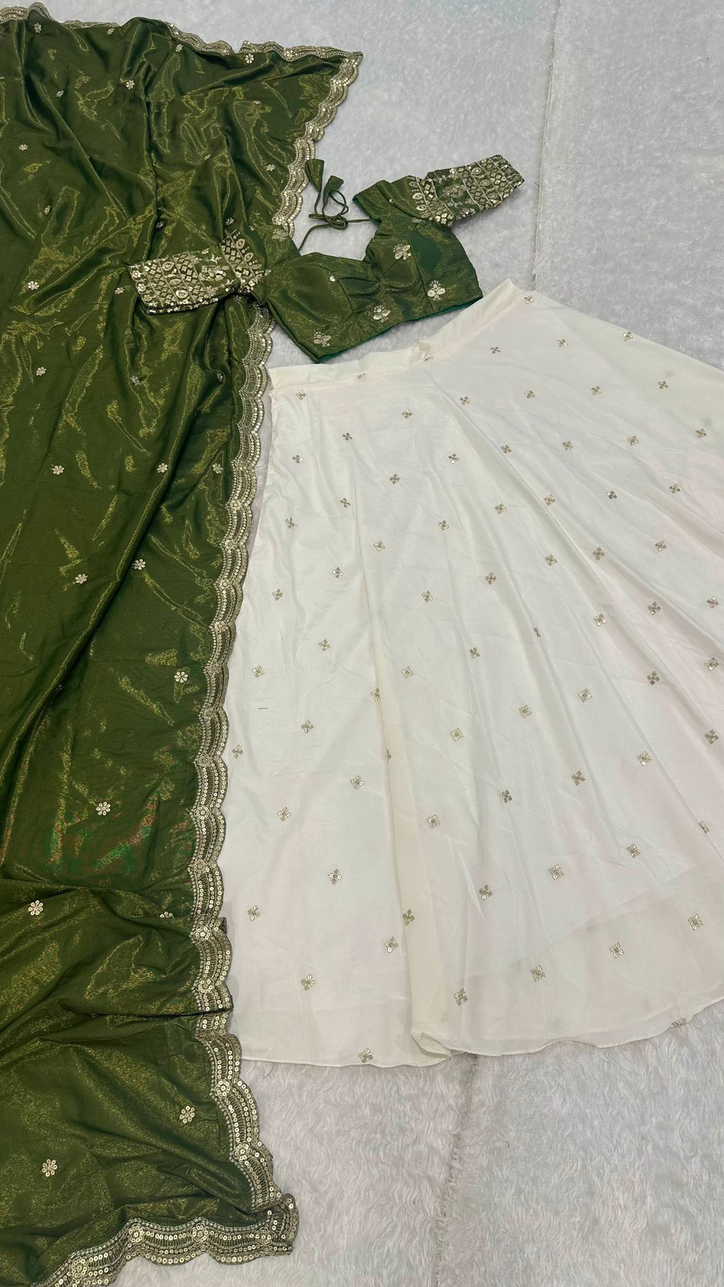 White Pure Crepe Silk Lehenga with Sequins & Zari Work and Shimmer Silk Green Dupatta ClothsVilla