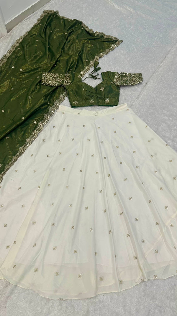 White Pure Crepe Silk Lehenga with Sequins & Zari Work and Shimmer Silk Green Dupatta ClothsVilla