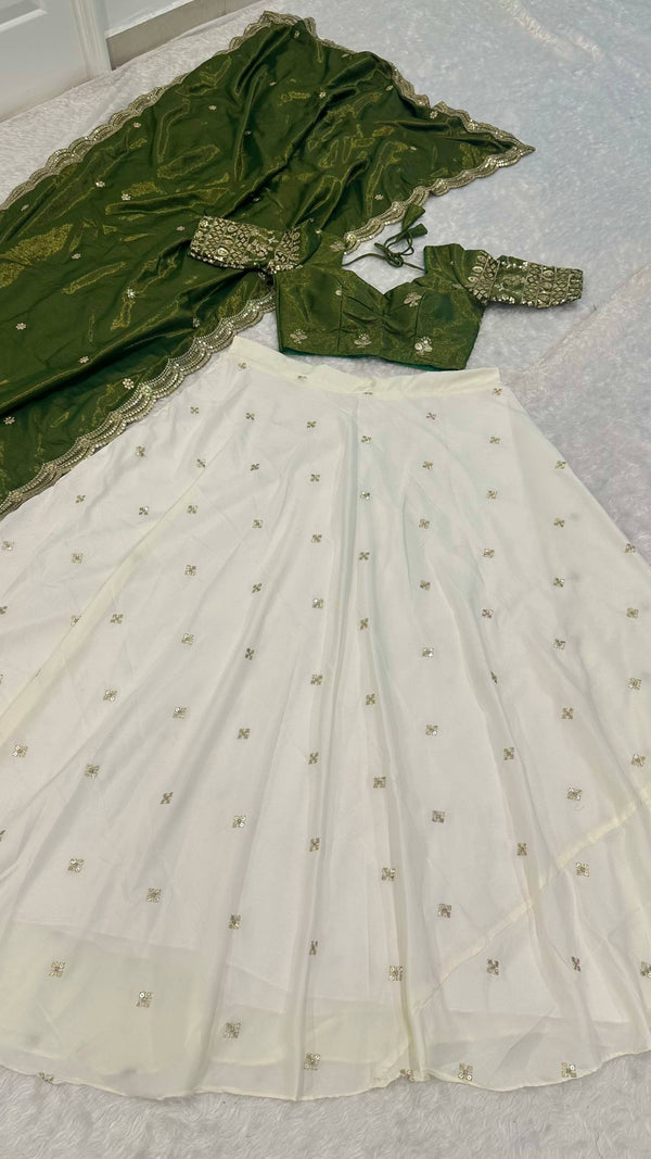 White Pure Crepe Silk Lehenga with Sequins & Zari Work and Shimmer Silk Green Dupatta ClothsVilla