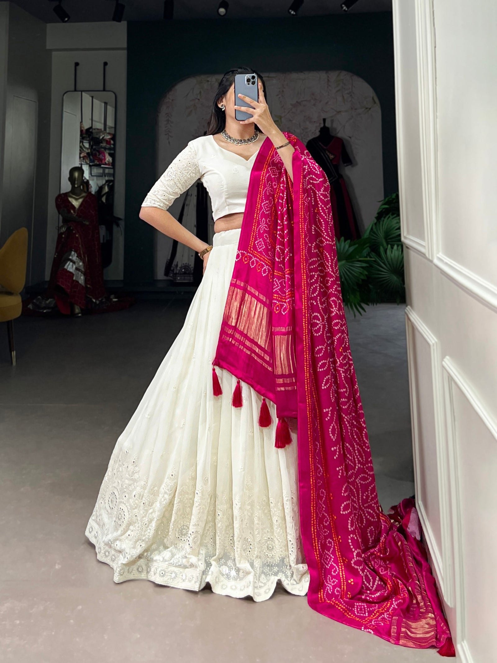 White Timeless Elegance Lucknowi Paper Mirror Work Georgette Lehenga Set