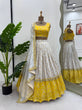 Load image into Gallery viewer, White &amp; Yellow Glamorous Jequrd Semi-Stitched Lehenga Set with Sequins &amp; Coding Work ClothsVilla