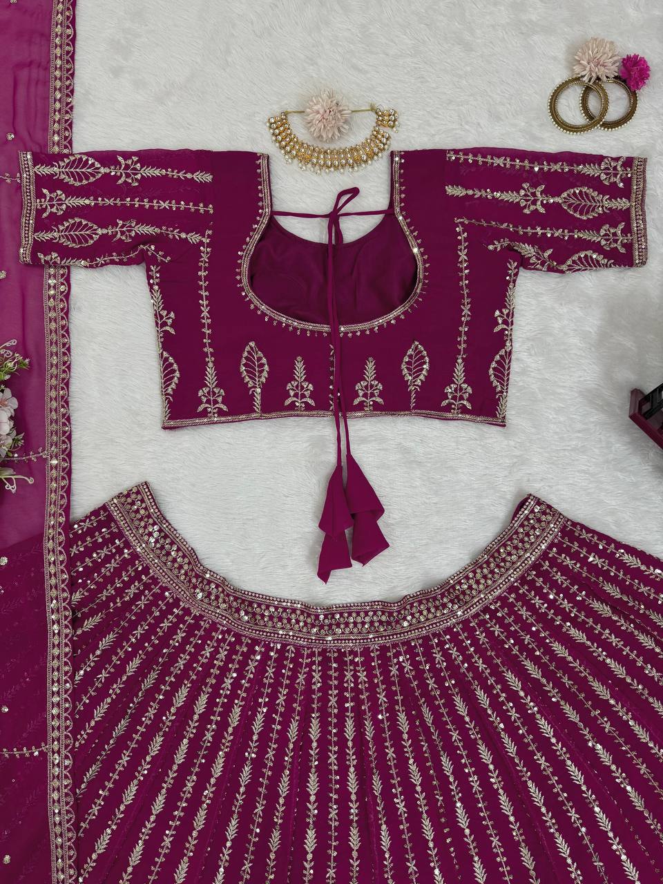 Wine Glamorous Faux Georgette Semi-Stitched Lehenga Set with Sequins & Cancan Flair Clothsvilla