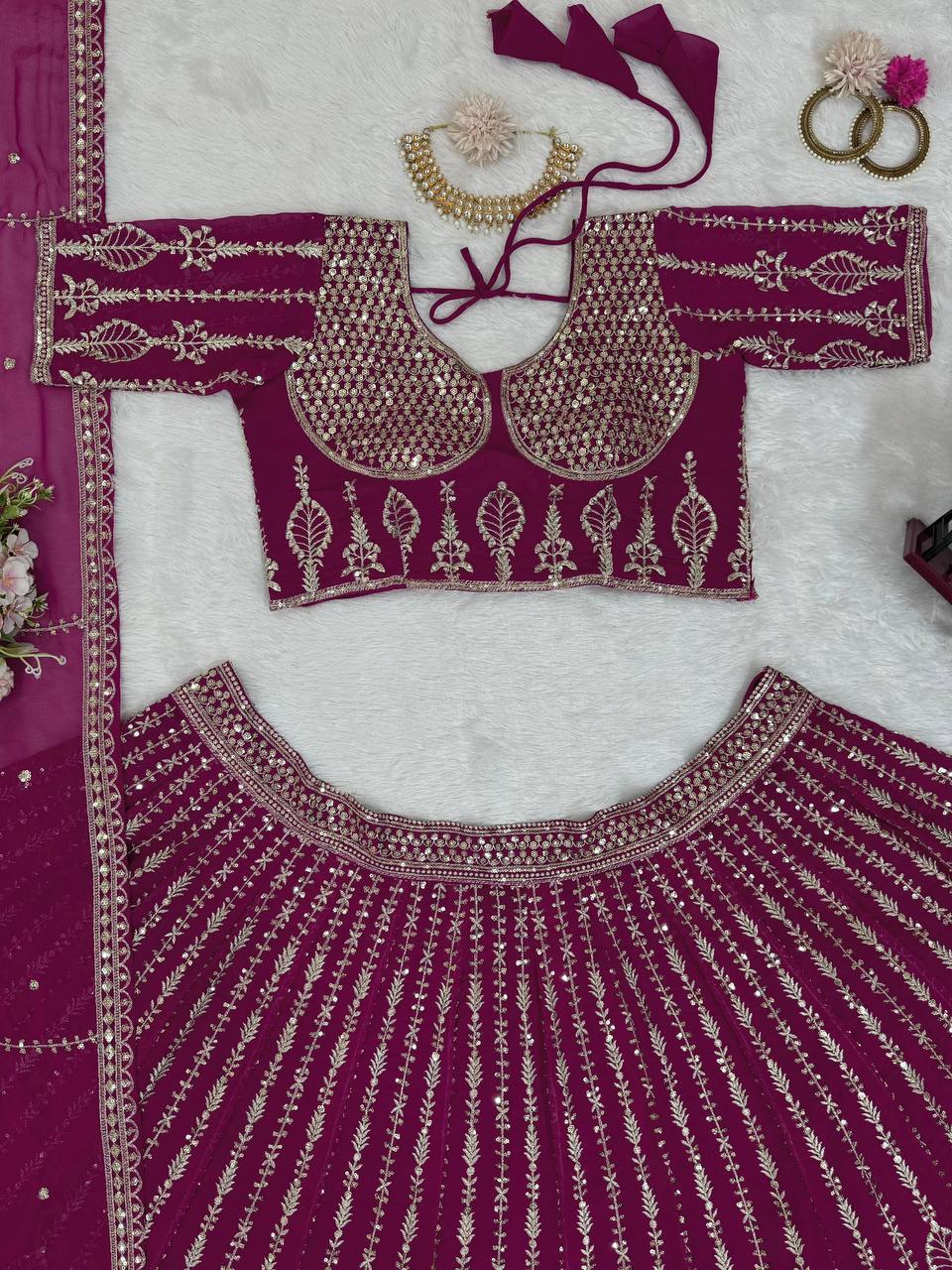 Wine Glamorous Faux Georgette Semi-Stitched Lehenga Set with Sequins & Cancan Flair Clothsvilla
