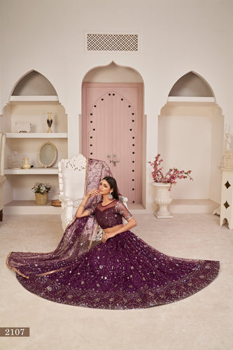 Wine Luxurious Butterfly Net Lehenga with All-Over Embroidery Clothsvilla