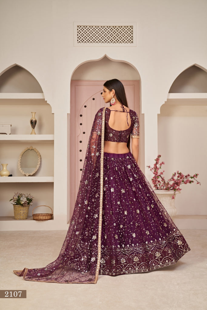 Wine Luxurious Butterfly Net Lehenga with All-Over Embroidery Clothsvilla