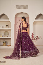 Load image into Gallery viewer, Wine Luxurious Butterfly Net Lehenga with All-Over Embroidery Clothsvilla