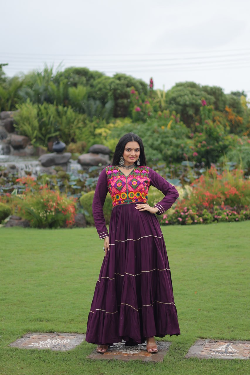 Wine Navratri Special 14 Kg Reyon Gown with Kutchi Gamthi & Mirror Hand Work – 4-Layer Frill, 10+ Meter Flair ClothsVilla