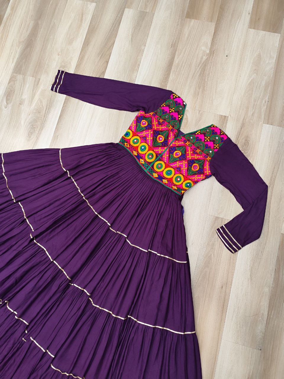 Wine Navratri Special 14 Kg Reyon Gown with Kutchi Gamthi & Mirror Hand Work – 4-Layer Frill, 10+ Meter Flair ClothsVilla