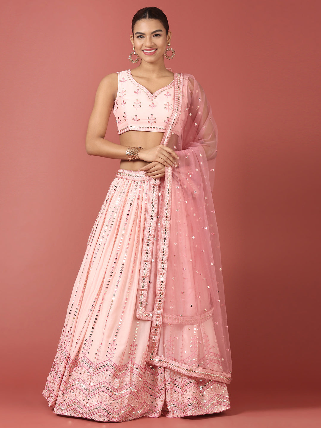 Women Peach Net Sequinse Embroidered Semi-Stitched Lehenga & Blouse with Dupatta Clothsvilla Main image