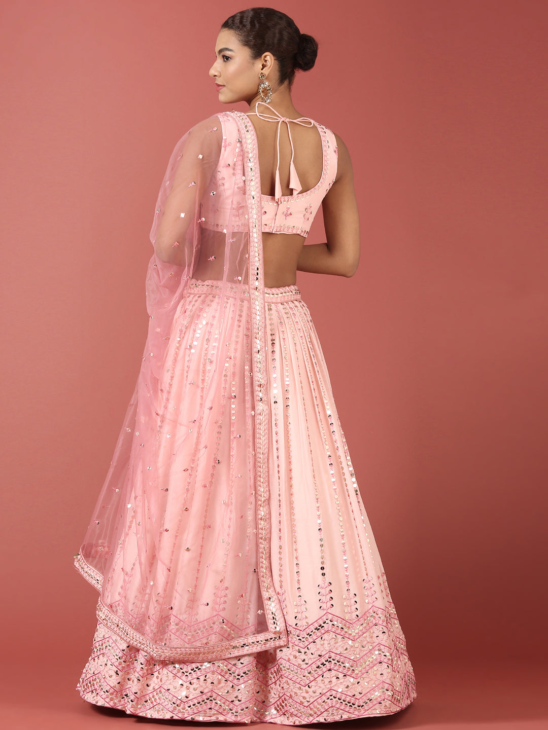 Women Peach Net Sequinse Embroidered Semi-Stitched Lehenga & Blouse with Dupatta Clothsvilla