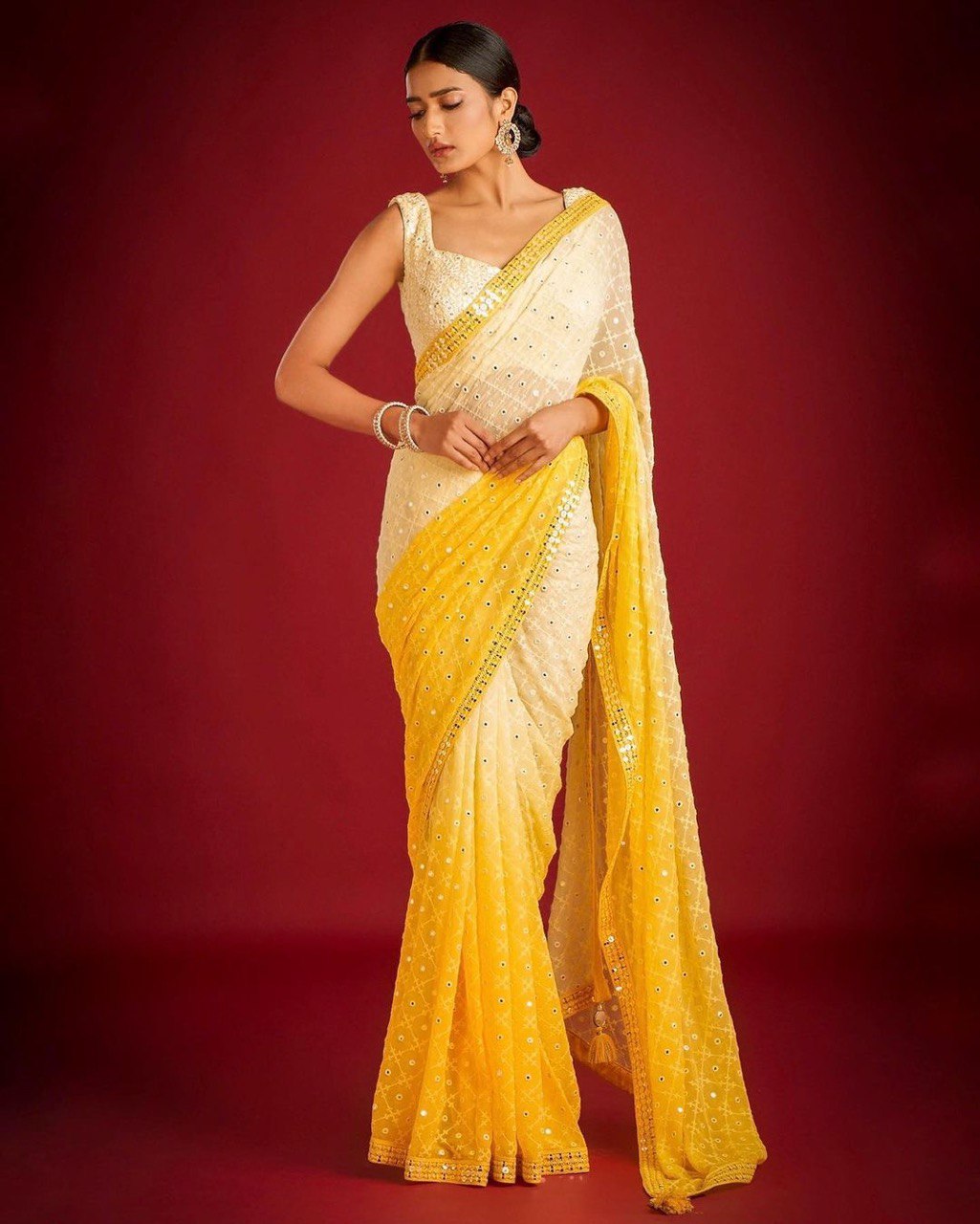 Yellow and White Pure Georgette Embroidered Sequence Work Saree ClothsVilla Main image