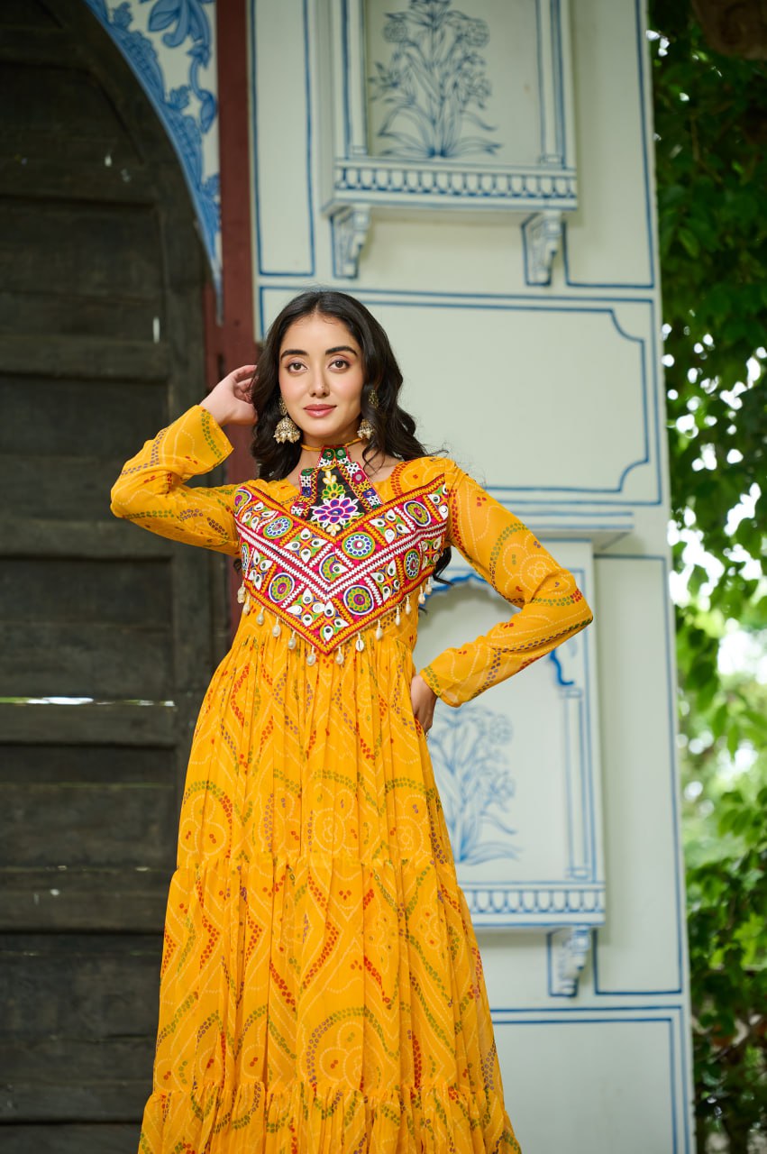 Yellow Bandhani Print Faux Georgette Gown with Kutchi Patchwork – Full Sleeves, 9 Meter Flair, Cotton Lining ClothsVilla