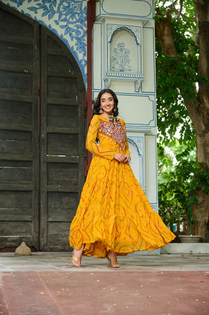 Yellow Bandhani Print Faux Georgette Gown with Kutchi Patchwork – Full Sleeves, 9 Meter Flair, Cotton Lining ClothsVilla