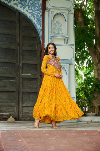 Yellow Bandhani Print Faux Georgette Gown with Kutchi Patchwork – Full Sleeves, 9 Meter Flair, Cotton Lining ClothsVilla