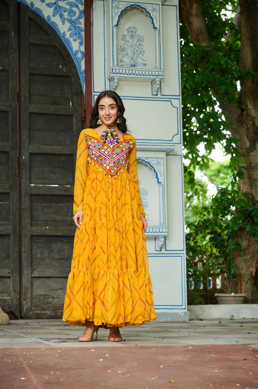 Yellow Bandhani Print Faux Georgette Gown with Kutchi Patchwork – Full Sleeves, 9 Meter Flair, Cotton Lining ClothsVilla