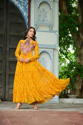 Yellow Bandhani Print Faux Georgette Gown with Kutchi Patchwork – Full Sleeves, 9 Meter Flair, Cotton Lining ClothsVilla