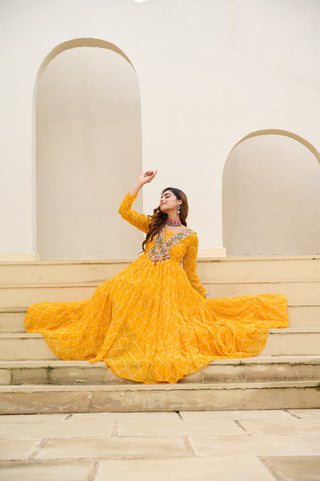 Yellow Bandhani Print Faux Georgette Gown with Kutchi Patchwork ClothsVilla